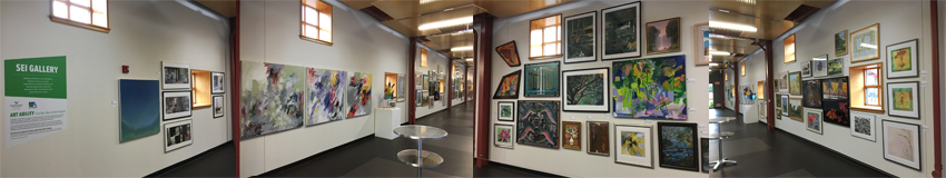 Gallery walls of Art Ability works at SEI in Oaks