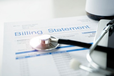 Healthcare billing statement and stethoscope