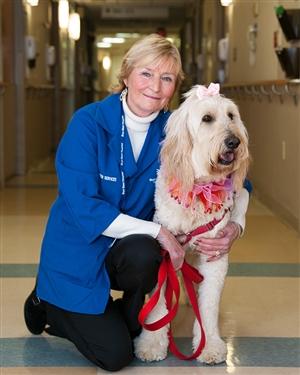 Bryn Mawr Hospital volunteer with their therapy dog