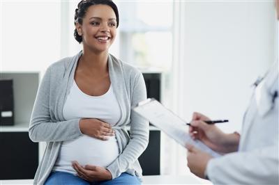Pregnant woman in doctor's office