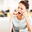 Woman yawning at desk