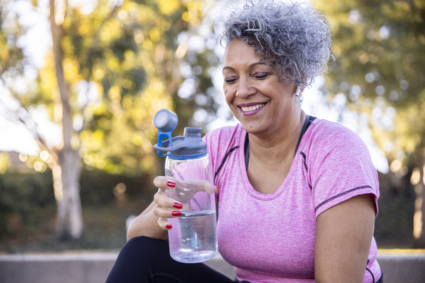 woman keeping hydrated to avoid pelvic floor issues