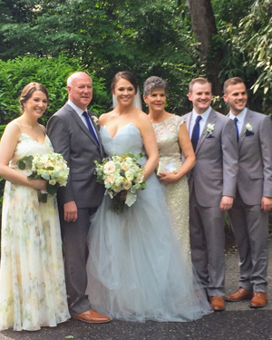Marie with her children and husband on her daughter's wedding day